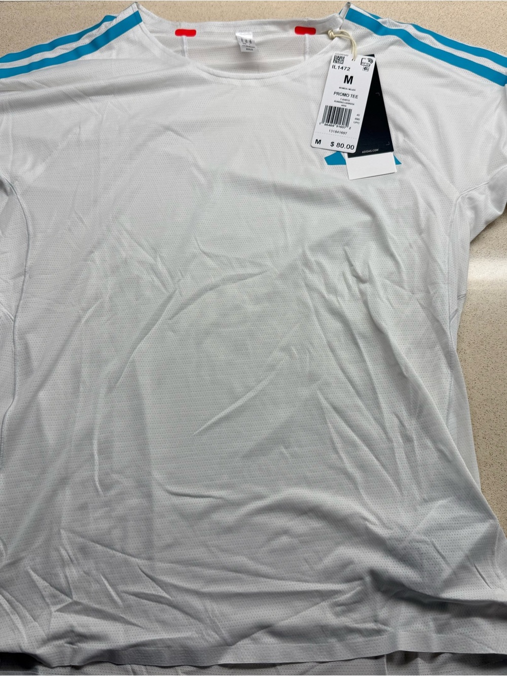 adidas women’s pro White Short Sleeve Tee with Blue Shoulder Stripes
